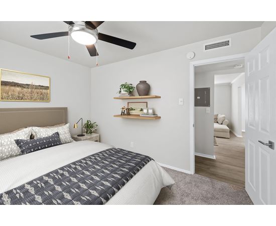 our apartments offer a bedroom with a king sized bed at Sunset Heights, San Antonio, TX, 78209